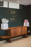 Bespoke Kambala wood dining table and matching benches by Junto