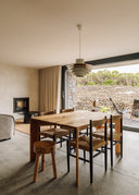 Custom burnt chestnut dining tables for Azores Wine Company by Junto