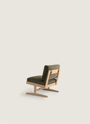 A 65cm wide Bernardo Lounge Chair in Darkened Oil finish, offering an expansive and comfortable bespoke seating experience.