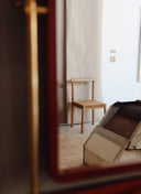 The Experience 1 Chair by JUNTO, a bespoke furniture piece featured at Lisbon Design Week for its expressive architectural proportions.