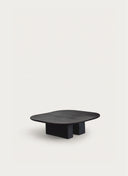Custom furniture Juntowd Nero table in Black Oil finish, a bold architectural centerpiece for luxury living rooms.