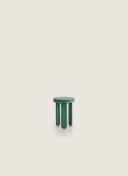Juntowd Trio Stool in a modern green wood paint finish, featuring a handcrafted chestnut structure and minimalist design, isolated on a white background.
